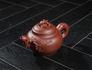 Why is Yixing Purple Clay Teapot highly esteemed in the world of tea culture