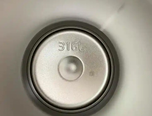 Why are there black lines and spots on the bottom of the thermos