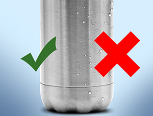 Why do small drops of water condense on the surface of the stainless steel vacuum flask after it is filled with cold water