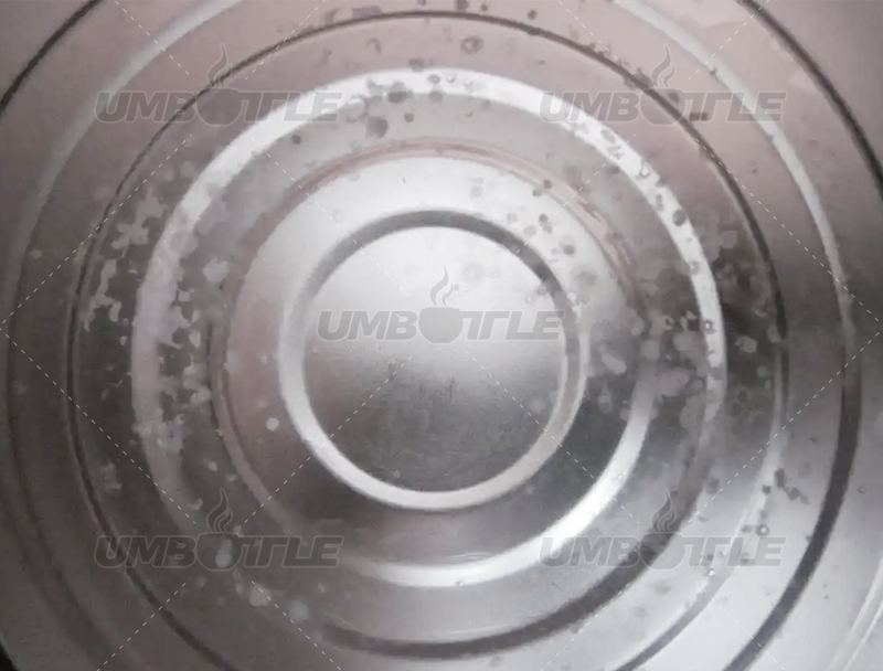 Why is it not recommended to use saltwater to clean the inner liner of stainless steel insulated cups?